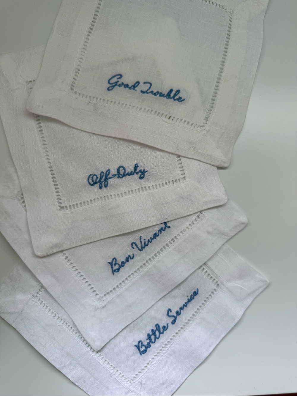 Embroidered White Linen Cocktail Napkins with Blue Script